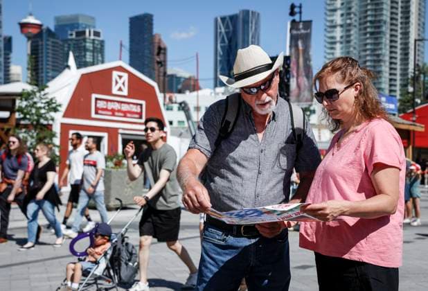 July 6, 2024, Calgary, Ab, CANADA: Visitors arrive at the Calgary Stampede in Calgary, Alta., Saturday, July 6, 2024. Calgary CANADA  - ZUMAc35_ 20240706_zaf_c35_006 Copyright: xJeffxMcintoshx