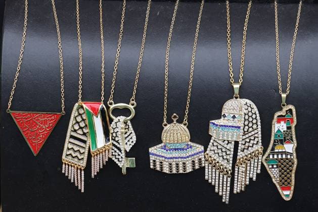 Support For Palestine In Toronto Amid The Israel Hamas Conflict Necklaces are being displayed that show solidarity for Gaza and Palestine amid the Israel-Hamas conflict at a small shop in Toronto, Ontario, Canada, on July 06, 2024. Toronto Canada  Copyright: xCreativexTouchxImagingxLtdx originalFilename: friedman-supportf240706_npm0a.jpg