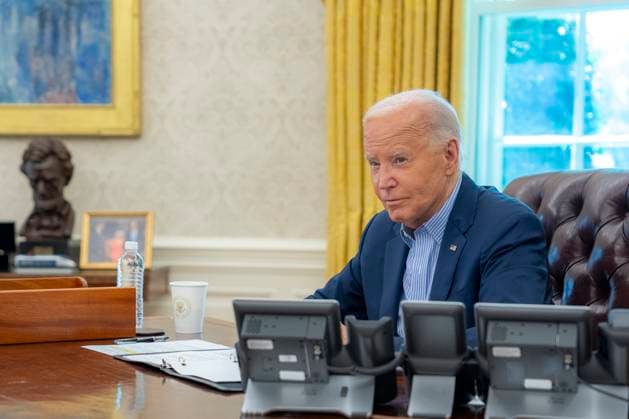 July 4, 2024 - Washington, District of Columbia, USA - President Joe Biden talks on the phone with Israeli Prime Minister Benjamin Netanyahu, Thursday, July 4, 2024, in the Oval Office.( Adam Schultz) Washington USA - ZUMAz03_ 20240704_shv_z03_943 Copyright: xWhitexHousex