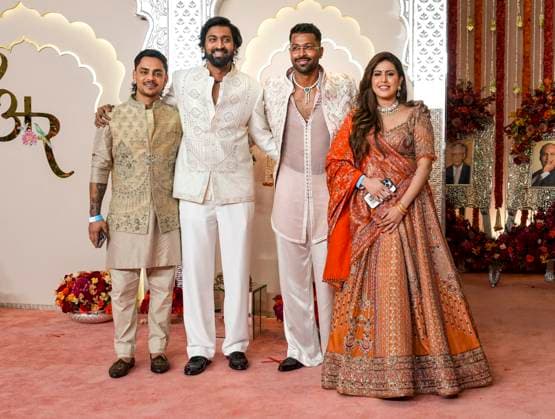 Anant Ambani-Radhika Merchant s wedding Mumbai: Cricketers Ishan Kishan, Hardik Pandya, Krunal Pandya and his wife Pankhuri Sharma pose for pictures upon their arrival for Anant Ambani and Radhika Merchant s wedding, at Jio World Convention Centre, in Mumbai, Friday, July 12, 2024. (PTI Photo Kunal Patil)(PTI07_12_2024_000248B) Mumbai Maharashtra India Copyright: x-x (PTI07_12_2024_000248B)
