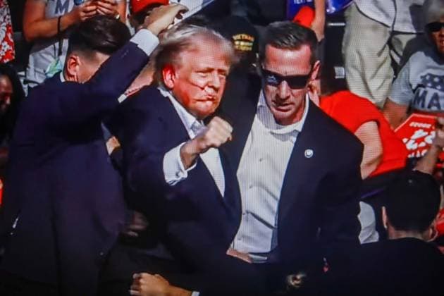 July 14, 2024, Butler, Pennsylvania, United States: In this photo illustration, a screen shows Former US President Donald Trump shot in the ear at a rally he was holding in Butler. Former US President Donald Trump was wounded in a shooting at a rally he was holding in Butler, Pennsylvania as part of his election campaign ahead of the 2024 US Presidential election. According to the latest reports, secret agents killed a shooter and one rally participant died at the hands of the shooter himself, the shooting at the rally is being investigated as an attempted assassination of former President Trump, the Associated Press reports, citing the Butler County District Attorney. Butler United States - ZUMAs197 20240714_aaa_s197_001 Copyright: xArtemxPriakhinx
