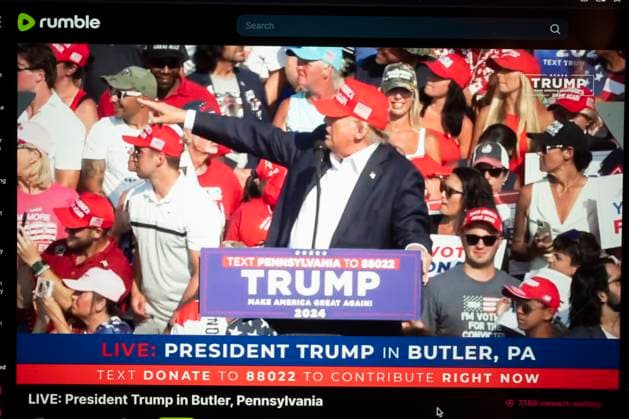 July 14, 2024, Butler, Pennsylvania, United States of America: A livestream on Rumble of Donald Trump being struck by gunfire during an assassination attempt was made on his life at a 2024 U.S. Presidential Election campaign rally in Butler Pennsylvania...President Donald Trump was grazed in the ear by a bullet in the from an alleged sniper from outside the MAGA campaign event perimeter from an elevated 1-story building. The U.S. Secret Service is reporting that two political supporters have been killed by gunfire and the alleged assailant was neutralized by law enforcement executive protection counter snipers. Butler United States of America - ZUMAb177 20240714_aap_b177_009 Copyright: xTaidghxBarronx