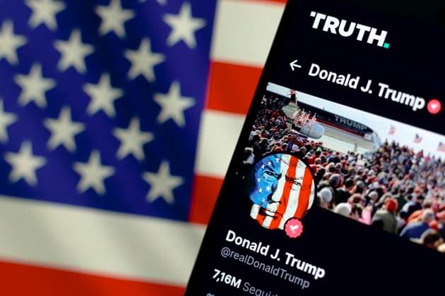 Photo illustration in Paraguay. In this photo illustration, the official profile of the former president of the United States Donald John Trump, seen on the social network Truth and in the background, the flag of the United States. The former president of U.S.A Donald John Trump, used his official profile on the Truth social network to say he was shot on the ear. Paraguay Copyright: xJaquexSilvax xSOPAxImagesx JAQUESILVA_13072024-4597