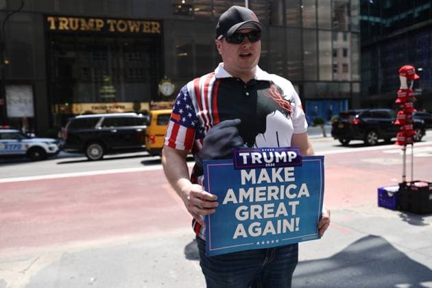 Trump Tower A Day After Donald Trump Injured In Shooting Supporter of Donald Trump is seen in front of the Trump Tower in New York City on July 14, 2024. On July 13 Donald Trump was injured in a shooting at the campaign rally in Butler, Pennsylvania New York City United States  Copyright: xJakubxPorzyckix originalFilename: porzycki-trumptow240714_npNQL.jpg