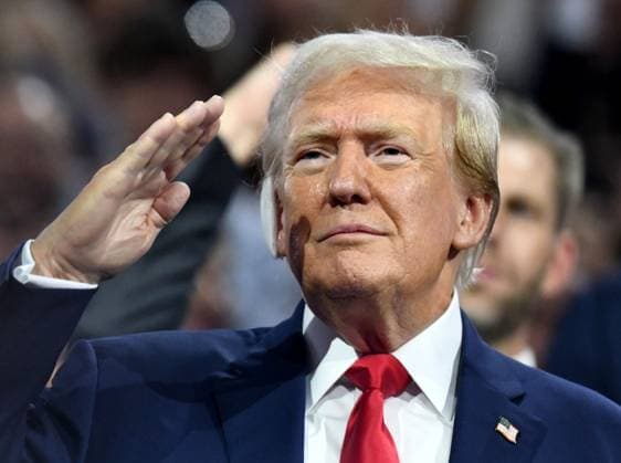 July 15, 2024, Milwaukee, Wisconsin, USA: Republican presidential nominee DONALD J. TRUMP salutes supporters the Republican National Convention at Fiserv Forum in Milwaukee. Trump s right ear is bandaged after being grazed during Saturday s assassination attempt. He was officially nominated during the afternoon session. Milwaukee USA - ZUMAh154 20240715_znp_h154_024 Copyright: xMarkxHertzbergx