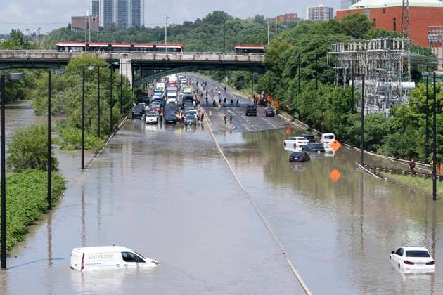 July 16, 2024, Toronto, On, Canada: Cars are partially submerged in flood waters in the Don Valley following heavy rain in Toronto, on Tuesday, July 16 2024. Toronto Canada  - ZUMAc35_ 20240716_zaf_c35_039 Copyright: xArlynxMcadoreyx