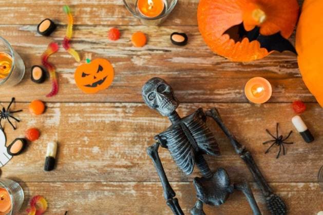 holidays concept - halloween decorations and candies wooden boards. halloween decorations and candies wooden boards ,model released, Symbolfoto