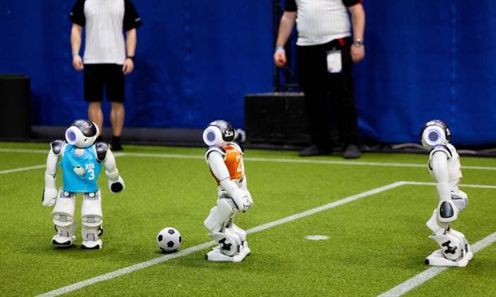 EINDHOVEN - Robots on the football field during a practice day in the run-up to the World Cup for Robots: RoboCup 2024. Universities and technology companies from all over the world show what their robots can do in various disciplines. ANP IRIS VAN DEN BROEK netherlands out - belgium out  Copyright: xx x503647583x originalFilename: 503647583.jpg