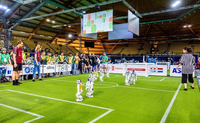 EINDHOVEN - Robot football during a practice day in the run-up to the World Cup for Robots: RoboCup 2024. Universities and technology companies from all over the world show what their robots can do in various disciplines. ANP IRIS VAN DEN BROEK netherlands out - belgium out  Copyright: xx x503649221x originalFilename: 503649221.jpg