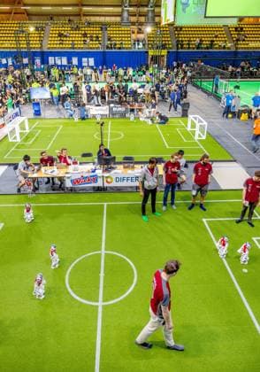EINDHOVEN - Robot football during a practice day in the run-up to the World Cup for Robots: RoboCup 2024. Universities and technology companies from all over the world show what their robots can do in various disciplines. ANP IRIS VAN DEN BROEK netherlands out - belgium out  Copyright: xx x503649500x originalFilename: 503649500.jpg