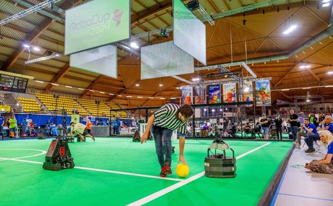 EINDHOVEN - Robot football during a practice day in the run-up to the World Cup for Robots: RoboCup 2024. Universities and technology companies from all over the world show what their robots can do in various disciplines. ANP IRIS VAN DEN BROEK netherlands out - belgium out  Copyright: xx x503649641x originalFilename: 503649641.jpg