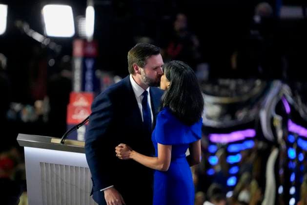 Vice President nominee JD Vance kisses his wife, Usha Chilukuri Vance, after speaking at the 2024 Republican National Convention at Fiserv Forum in Milwaukee, Wisconsin on Wednesday, July 17, 2024. The third day of the convention is expected to focus on national security and foreign policy.  MIL20240717350 DAVIDxBANKS
