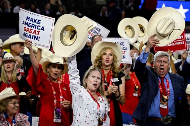 Delegates from Texas wave cowboy hats during the 2024 Republican National Convention at Fiserv Forum in Milwaukee, Wisconsin on Thursday, July 18, 2024. The theme of the final day is Make America Great Once Again, with former President Donald Trump as the featured speaker.  MIL20240718302 MATTxMARTON