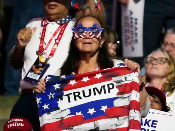 A delegate from Alabama shows her support at the 2024 Republican National Convention at Fiserv Forum in Milwaukee, Wisconsin on Thursday, July 18, 2024. The theme of the final day is Make America Great Again, with former President Donald Trump as the featured speaker.  MIL20240718751 DAVIDxBANKS