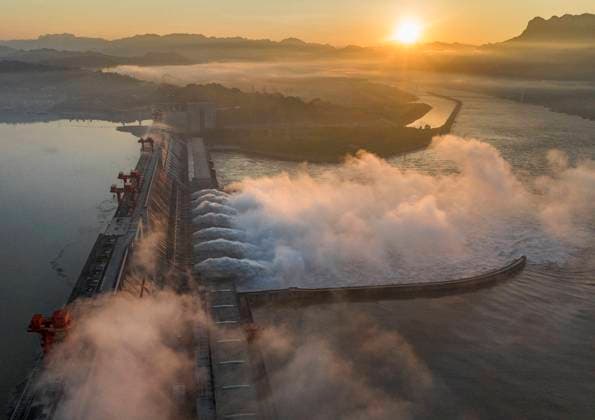 Three Gorges Dam Release Floodwater View YICHANG, CHINA - JULY 21, 2024 - A spectacular view shows the opening of the Three Gorges Dam to release floodwater in Yichang, Hubei province, China, July 21, 2024. Yichang Hubei China  Copyright: xCFOTOx i1721549292806