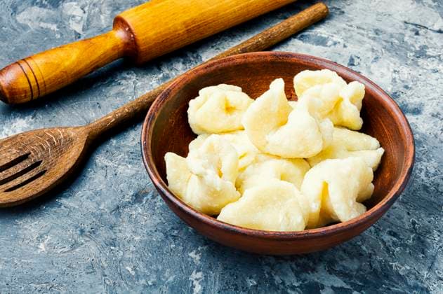 IMAGO Creative, Food, Dumplings Traditional russian or ukrainian cottage cheese lazy dumplings.Homemade dumplings. Ukrainian lazy dumplings ,model released, Symbolfoto