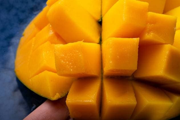 Ripe and tasty egyption Mango cubes. macro shot ,model released, Symbolfoto