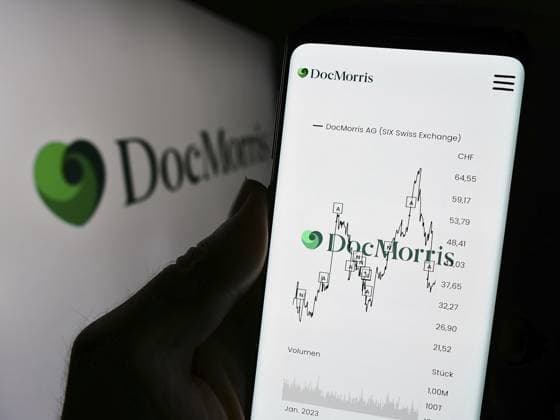 Stuttgart, Germany, 11-08-2023: Person holding cellphone with webpage of Swiss online pharmacy company DocMorris AG in front of logo. Focus on center of phone display, Europe Copyright: imageBROKER TimonxSchneider ibliqx10729105.jpg