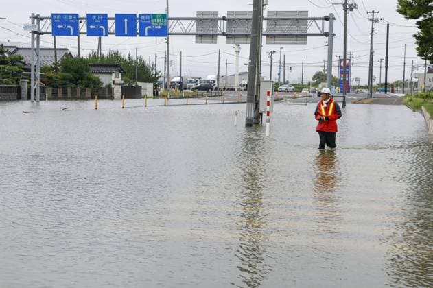 News Themen der Woche KW 30 News Bilder des Tages Heavy rain in northeastern Japan A street in Sakata in the northeastern Japan prefecture of Yamagata is flooded on July 26, 2024, following heavy rain.  A14AA0003180416P