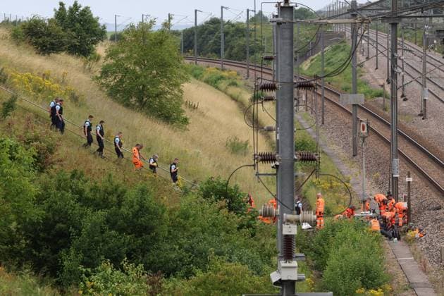 Bilder des Jahres 2024, News 07 Juli News Themen der Woche KW 30 News Bilder des Tages acte de malveillance ligne TGV Lille Paris PHOTOPQR VOIX DU NORD Maillard 26 07 2024 croisilles le 26 07 2024 acte de malveillance sur la ligne TGV Lille avec gendarmerie LUDOVIC MAILLARD LA VOIX DU NORD JULY 26 2024 France Massive attack on fast train network French train operator SNCF has reported acts of intentional vandalism on several high speed rail routes The incidents, which have led to disruption, come immediately ahead of the opening of the 2024 Paris Olympics 1 NORD PAS DE CALAIS France  Copyright: xPHOTOPQR VOIXxDUxNORD MAXPPPxMaillardx 20240726VDN2074 20240726VDN2136