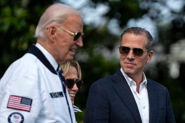 Hunter Biden looks towards President Joe Biden and Valerie Biden Owens while exiting the White House to board Marine One en route to Camp David in Washington, DC on Friday, July 26, 2024. The 2024 Paris Olympics will take place from July 26 to August 11.  WAP20240726331 BONNIExCASH