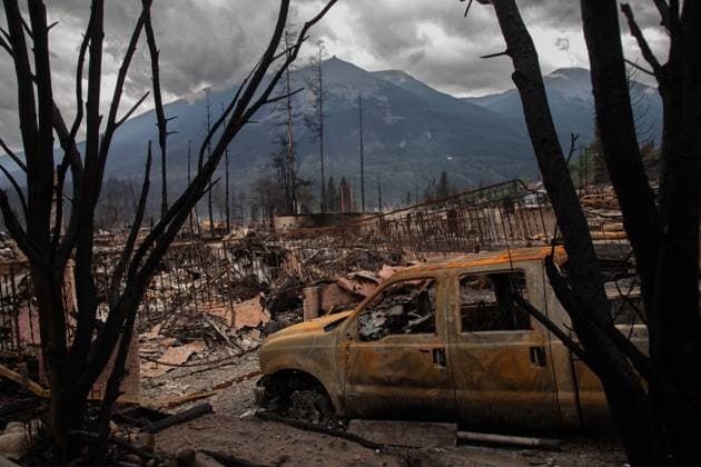 July 26, 2024, Jasper, Ab, CANADA: A devastated residential neighbourhood in Jasper, Alta., on Friday July 26, 2024. Wildfires encroaching into the townsite of Jasper forced an evacuation of the national park and have destroyed over 300 of the town s approximately 1100 structures, mainly impacting residential areas. Jasper CANADA  - ZUMAc35_ 20240726_zaf_c35_167 Copyright: xAmberxBrackenx