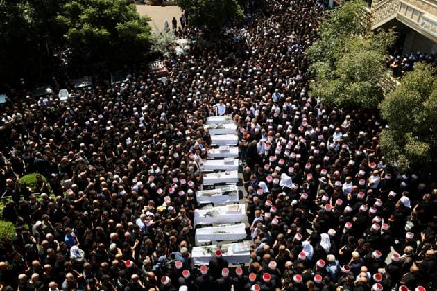 Bilder des Jahres 2024, News 07 Juli News Themen der Woche KW 30 News Bilder des Tages (240728) -- GOLAN HEIGHTS, July 28, 2024 -- This photo taken on July 28, 2024 shows the funeral of the people killed in a rocket attack in the Druze town Majdal Shams, in the Israeli-occupied Golan Heights. Israeli officials have called for retaliation against Hezbollah following a rocket attack on a football pitch in Majdal Shams in the Israeli-occupied Golan Heights that killed at least 12 children and youths on Saturday. The Lebanese Shiite militant group has denied involvement. (Photo by Jamal Awad Xinhua) MIDEAST-GOLAN HEIGHTS-ROCKET ATTACK ZongxHe 