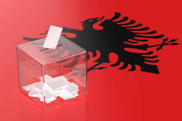 Concept image for elections in Albania Ballot box with the flag of Albania Copyright: xZoonar.com MilexAtanasovx 21685432