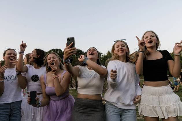 August 1, 2024, Warsaw, Poland: Taylor Swift s fans are seen singing and dancing outside the National Stadium, where her first of three concerts in Poland is taking place as part of the Eras Tour. American singer Taylor Swift will play three concerts in Warsaw, Poland on August 1, 2, and 3 as part of her Eras Tour. The event takes place at the National Stadium (PGE Stadion Narodowy). Thousands of people from Poland and other countries will attend the concert itself. However, some fans, known as Swifties, gathered around the stadium to hear the star. Warsaw Poland - ZUMAs197 20240801_aaa_s197_105 Copyright: xVolhaxShukailax