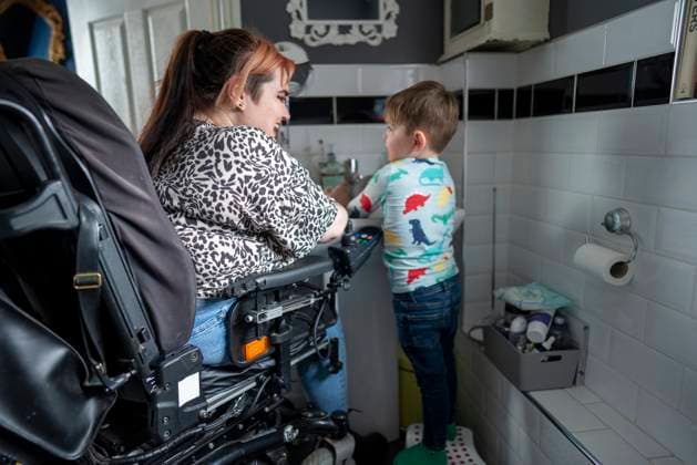 Mother in wheelchair with son in bathroom model released Copyright: xTimmxCleasbyx