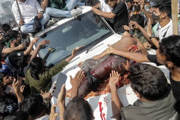 Bangladeshi People Celebrate after PM fleeing Protesters placed an injured protestor on the bonnet of an Army officials vehicle asking for justice who was shot by a police officer during the victory march after the fall of Prime Minister Sheikh Hasina in Dhaka, Bangladesh, August 05, 2024. Dhaka Dhaka Bangladesh Copyright: xAnikxRahmanx