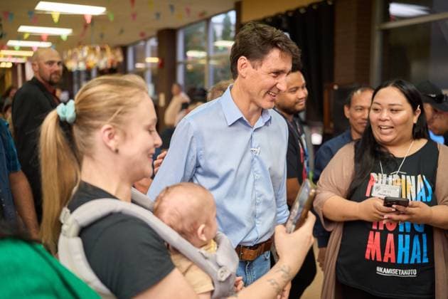 August 5, 2024, Winnipeg, Mb, CANADA: Prime Minister Justin Trudeau greets members of the audience at the Folklorama Filipino Pavilion in Winnipeg, Monday, Aug. 5, 2024, at R.B. Russell Vocational School. Winnipeg CANADA  - ZUMAc35_ 20240805_zaf_c35_089 Copyright: xDavidxLipnowskix