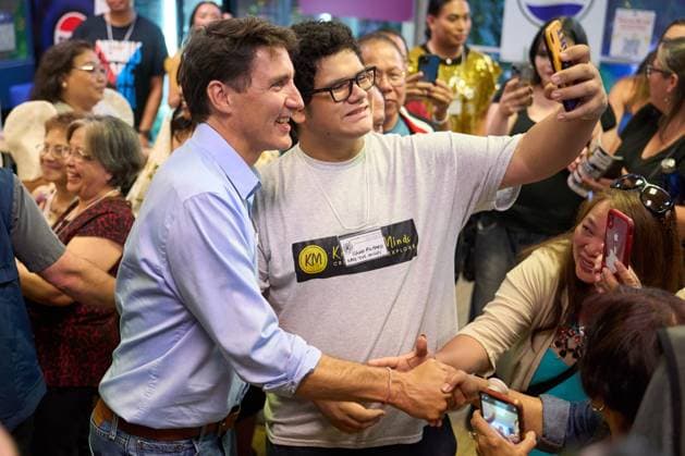 August 5, 2024, Winnipeg, Mb, CANADA: Prime Minister Justin Trudeau greets members of the audience at the Folklorama Filipino Pavilion in Winnipeg, Monday, Aug. 5, 2024, at R.B. Russell Vocational School. Winnipeg CANADA  - ZUMAc35_ 20240805_zaf_c35_091 Copyright: xDavidxLipnowskix