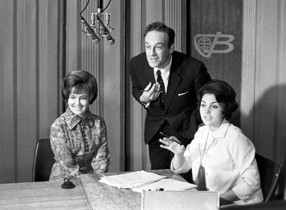 Moscow, USSR. Announcers of the Central Television of the USSR State Television and Radio Broadcasting Company Svetlana Zhiltsova, Igor Kirillov and Aza Likhitchenko (L-R) prepare for the next release of the information programme Vremya in the studio of the hardware and studio complex ASK-1 of the All-Union Television CentrÃÂµ in Ostankino. Vasily Yegorov, Alexei Stuzhin TASS  2678059