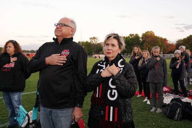 September 25, 2018, Mankato, Minnesota, USA: Gubernatorial candidate Tim Walz and his wife Gwen stood for the National Anthem at the start of their daughter Hope s soccer game at the Caswell North Soccer Complex in Mankato, Minn. Gubernatorial candidate Tim Walz profile, including a trip to his shooting club, his daughter s senior night soccer game at Mankato West, and campaign stops at the Teamsters 320 quarterly meeting, the Hazelden Betty Ford Event Pathways and Partnership Conference, and a Carpenters Delegate Meeting. Mankato USA - ZUMAm42_ 20180925_pnj_m67_044 Copyright: xAnthonyxSoufflex
