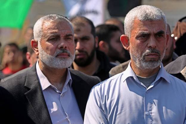 Yahya Sinwar, the new leader of Hamas in the Gaza Strip and senior political leaders of the Islamist movement, Ismail Haniyeh attend the funeral of Hamas official, Mazen Faqha FILE PHOTO:Yahya Sinwar, the new leader of Hamas in the Gaza Strip and senior political leaders of the Islamist movement, Ismail Haniyeh attend the funeral of Hamas official, Mazen Faqha in Gaza city on March 25, 2017. Gunmen in the Gaza Strip had shot dead the Hamas official on March 24, 2017, according to Iyad al-Bozum, an interior ministry spokesman in the Hamas-ruled Gaza Strip. Faqha had been released by Israel six years earlier in the 2011 prisoner swap which exchanged more than 1,000 other Palestinians for Gilad Shalit, an Israeli soldier Hamas had detained for Copyright: xapaimagesxAshrafxAmraxx xapaimagesx