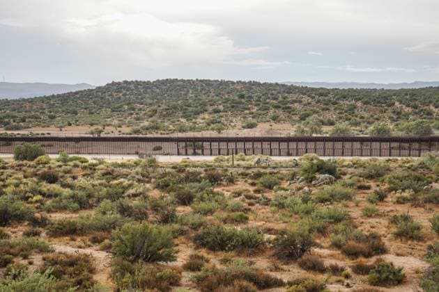 US-Mexico Border Wall in Jacumba Hot Springs - 11 Aug 2024 A general view of the border wall from the side of the United States. The area in Jacumba Hot Springs in California is one of the popular places that migrants cross the border from Mexico to the United States. Even though there are a lot of officers patrol on both sides, hundreds of migrants still enter the United States everyday. Jacumba Hot Springs United States Copyright: xMichaelxHoxWaixLeex xSOPAxImagesx MichaelHo4391