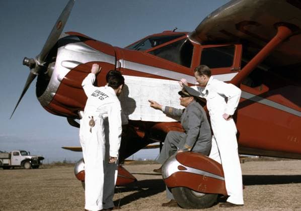 Instructor and students studying map, Meacham Field, Fort Worth, Texas, USA, Arthur Rothstein, U.S. Farm Security Administration , January 1942  Copyright: xCircaxImagesx ghi-circa01698