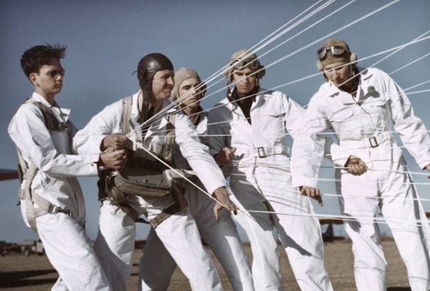 Instructor explaining operation of parachute to student pilots, Meacham Field, Fort Worth, Texas, USA, Arthur Rothstein, U.S. Farm Security Administration , January 1942  Copyright: xCircaxImagesx ghi-circa01699