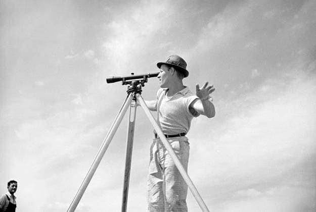 Surveyor working in Model Community planned by Suburban Division of U.S. Resettlement Administration, Greenbelt, Maryland, USA, Carl Mydans, U.S. Resettlement Administration, July 1936  Copyright: xCircaxImagesx ghi-circa02304