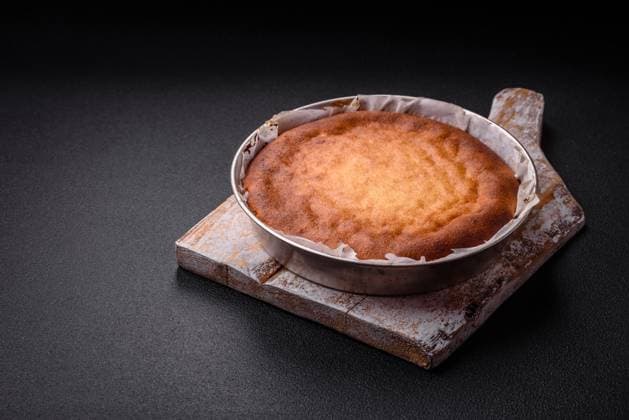 Delicious homemade round baked mince pie or tart Delicious homemade round baked mince pie or tart on textured concrete background Copyright: xZoonar.com TetianaxChernykovax 21728452