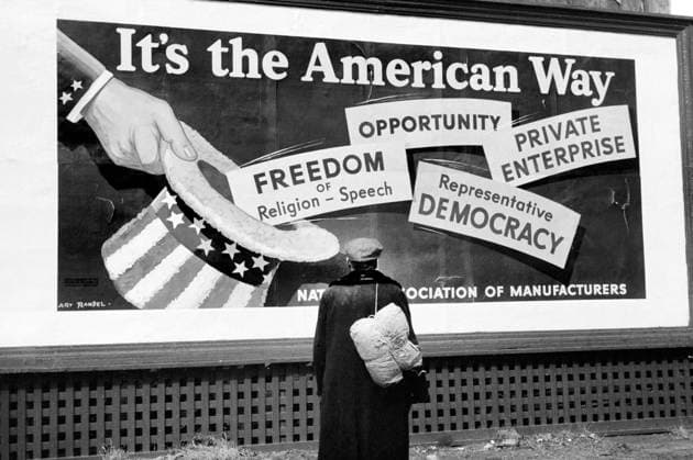 Man standing in front of National Association of Managers Billboard, Dubuque, Iowa, USA, John Vachon, U.S. Farm Security Administration, April 1940  Copyright: xCircaxImagesx ghi-circa02540