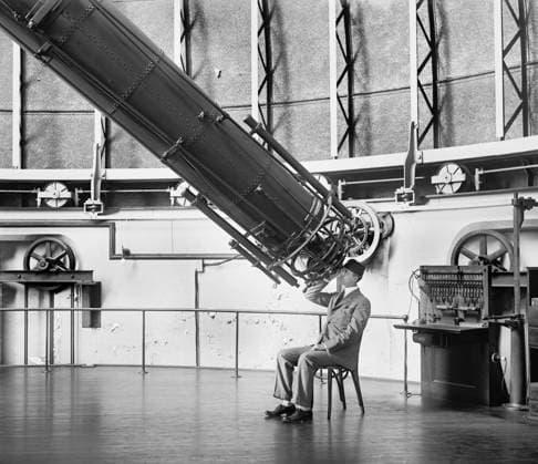 Professor H.E. Burton looking through Telescope, U.S. Naval Observatory, Washington DC, USA, National Photo Company, August 1929  Copyright: xCircaxImagesx ghi-circa02636
