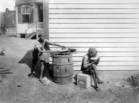 Two young boys eating watermelon, Detroit Publishing Company, 1901  Copyright: xCircaxImagesx ghi-circa03729
