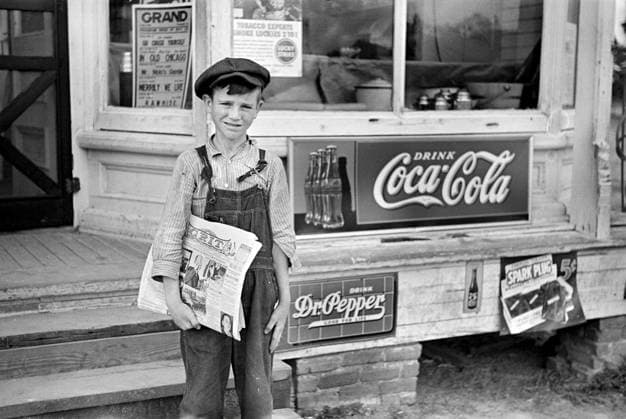 Newsboy Selling Grit , Irwinville Farms, Georgia, USA, John Vachon for Farm Security Administration, May 1938  Copyright: xCircaxImagesx ghi-circa04610