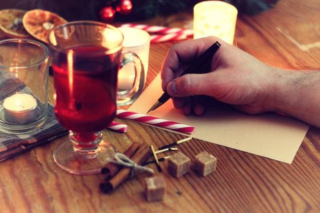 christmas hand writing story New Year s Eve celebration package gifts and signature cooking festive drinks ,model released, Symbolfoto Copyright: xZoonar.com AleksandrxKichiginx 9840461 ,model released, Symbolfoto ,property released