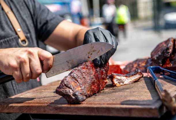August 14, 2024, Toronto, On, Canada: Chef Matt Basile slices meat on media preview day at the Canadian National Exhibition in Toronto on Wednesday, August 14, 2024. Toronto Canada  - ZUMAc35_ 20240814_zaf_c35_032 Copyright: xLauraxProctorx