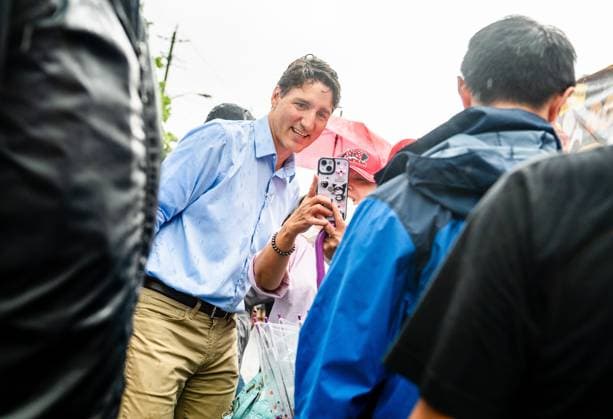 August 17, 2024, Toronto, On, Canada: Prime Minister Justin Trudeau greets people as rain falls at the Taste of Manila festival in Toronto on Saturday, August 17, 2024. Toronto Canada  - ZUMAc35_ 20240817_zaf_c35_021 Copyright: xLauraxProctorx