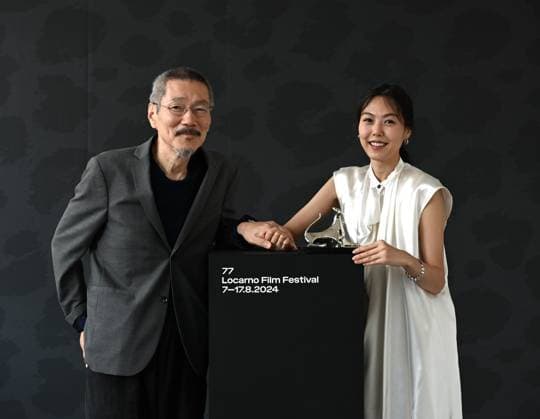 Locarno: Locarno,Switzerland Locarno Film Festival 2024 Award Ceremony photocall Locarno Film Festival 2024 SUYOOCHEON film by Hong Sangsoo director Pardo Argento Award and Kim Minhee actress best performance In the photo:Kim Minhee actress best performance Pardo Argento Award and Hong Sangsoo director Locarno  - ZUMAp169 20240817_zea_p169_155 Copyright: xNickxZonnax
