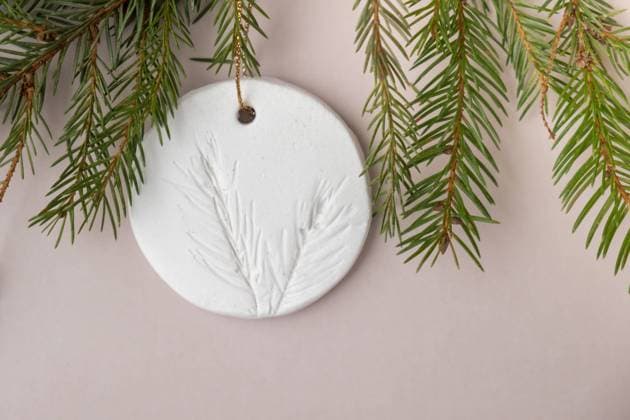 White air dry clay for making decor to Christmas tree holiday. Creating hobby recreation activity that involves fingers. DIY crafting White air dry clay for making decor to Christmas tree holiday. Creating hobby recreation activity that involves fingers. DIY crafting Modern art Copyright: xZoonar.com AnastasiiaxYanishevskax 21983627